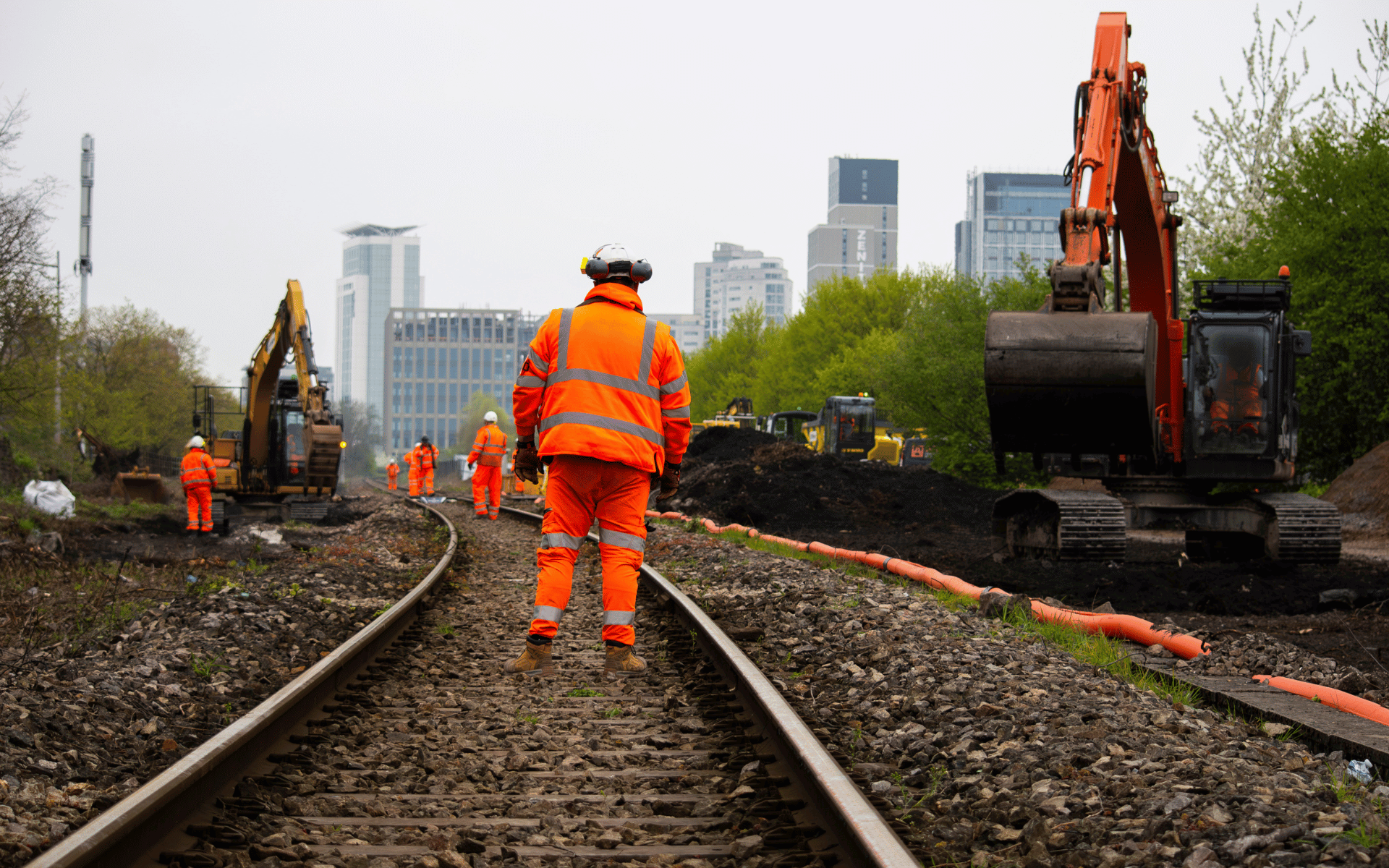 Rail Planning Services Men working on tracks Rail Planning Services Men working on tracks